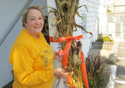 St. Paul’s member Gerrie Oliver sets up harvest decorations at St. Paul’s Lutheran Church in Closter.